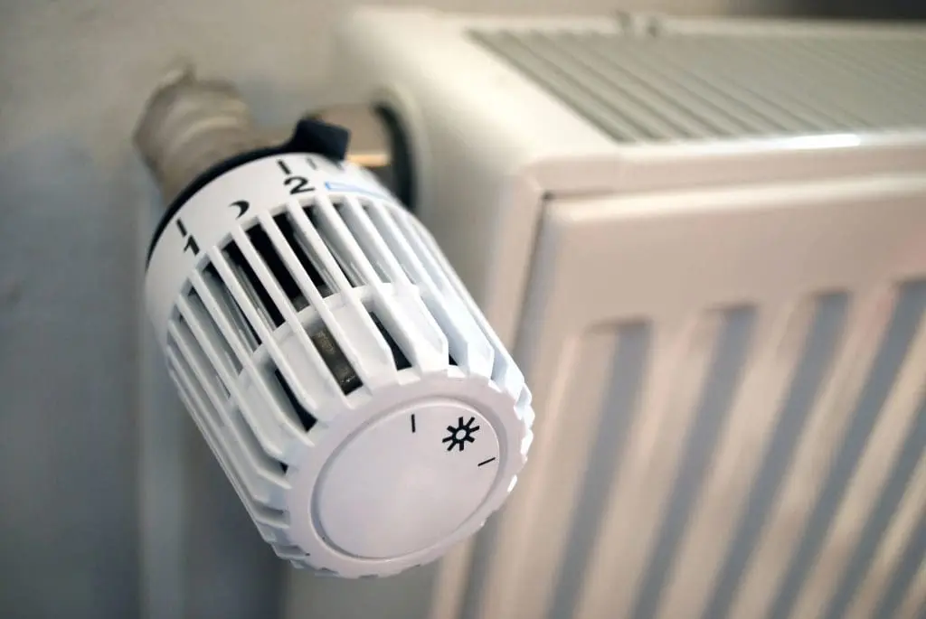 Macro of a white thermostat and heating